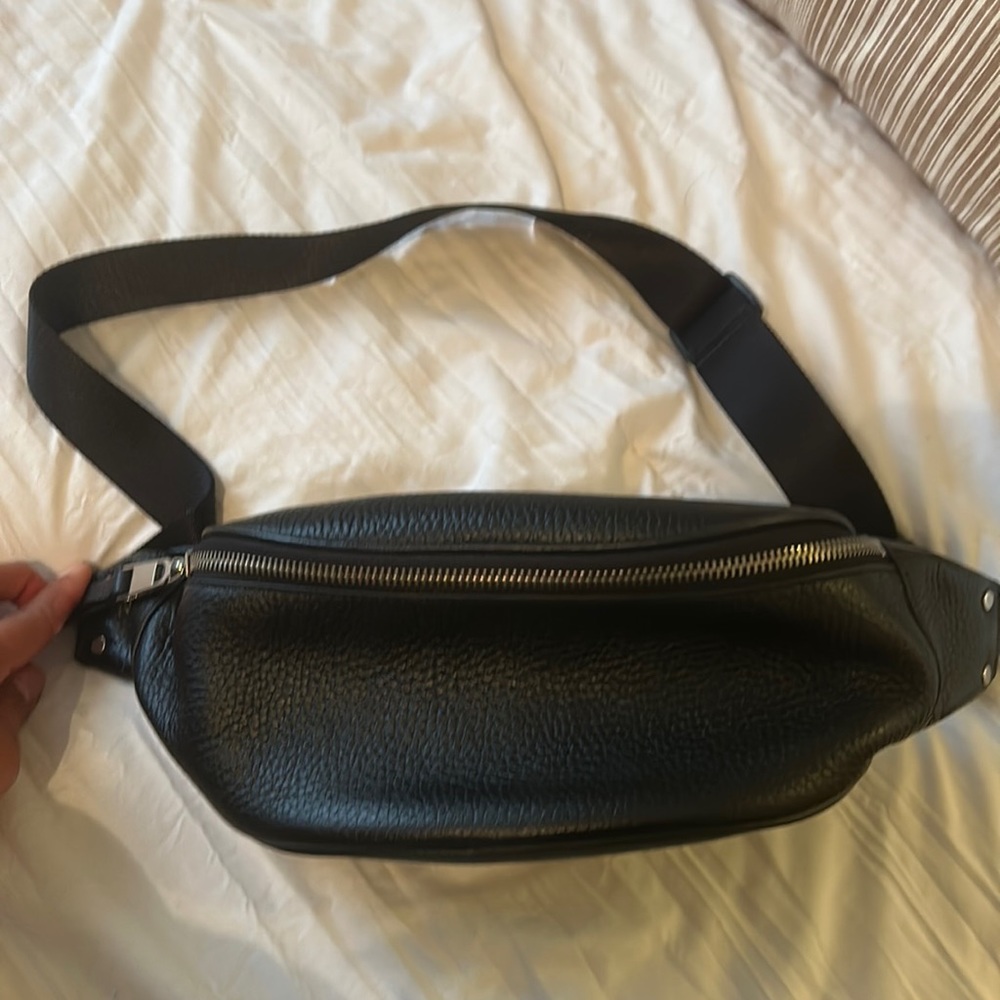 Pebbled leather Fanny pack with silver hardware. Never used